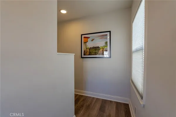 a view of entryway with wooden floor
