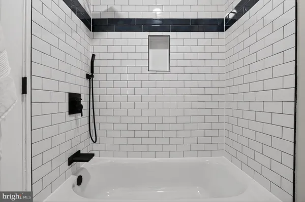 a bathroom with a bathtub