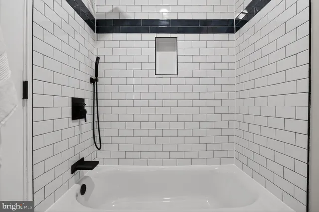 a bathroom with a bathtub
