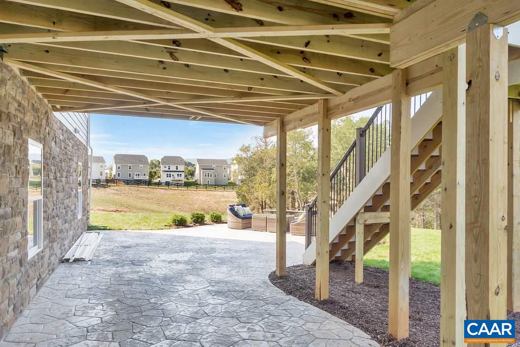2128 Ridgetop Drive Charlottesville, VA 22903 - Photo 6 of 46 a view of swimming pool with a patio and a yard