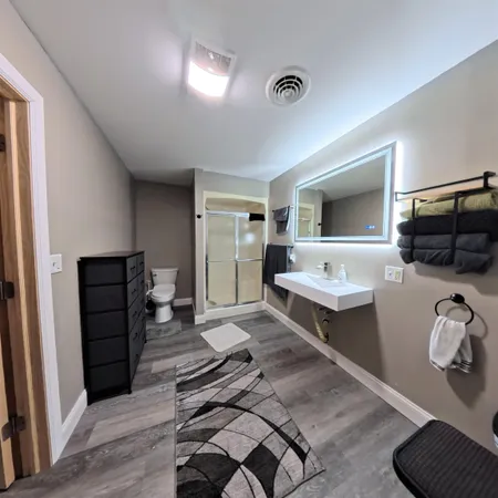 a area with lots of furniture and clutter
