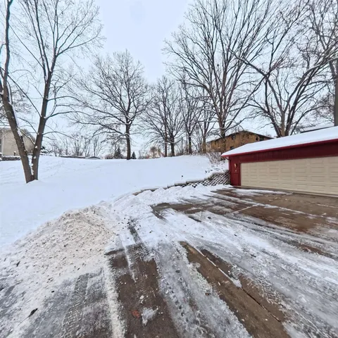 a view of snow on the road
