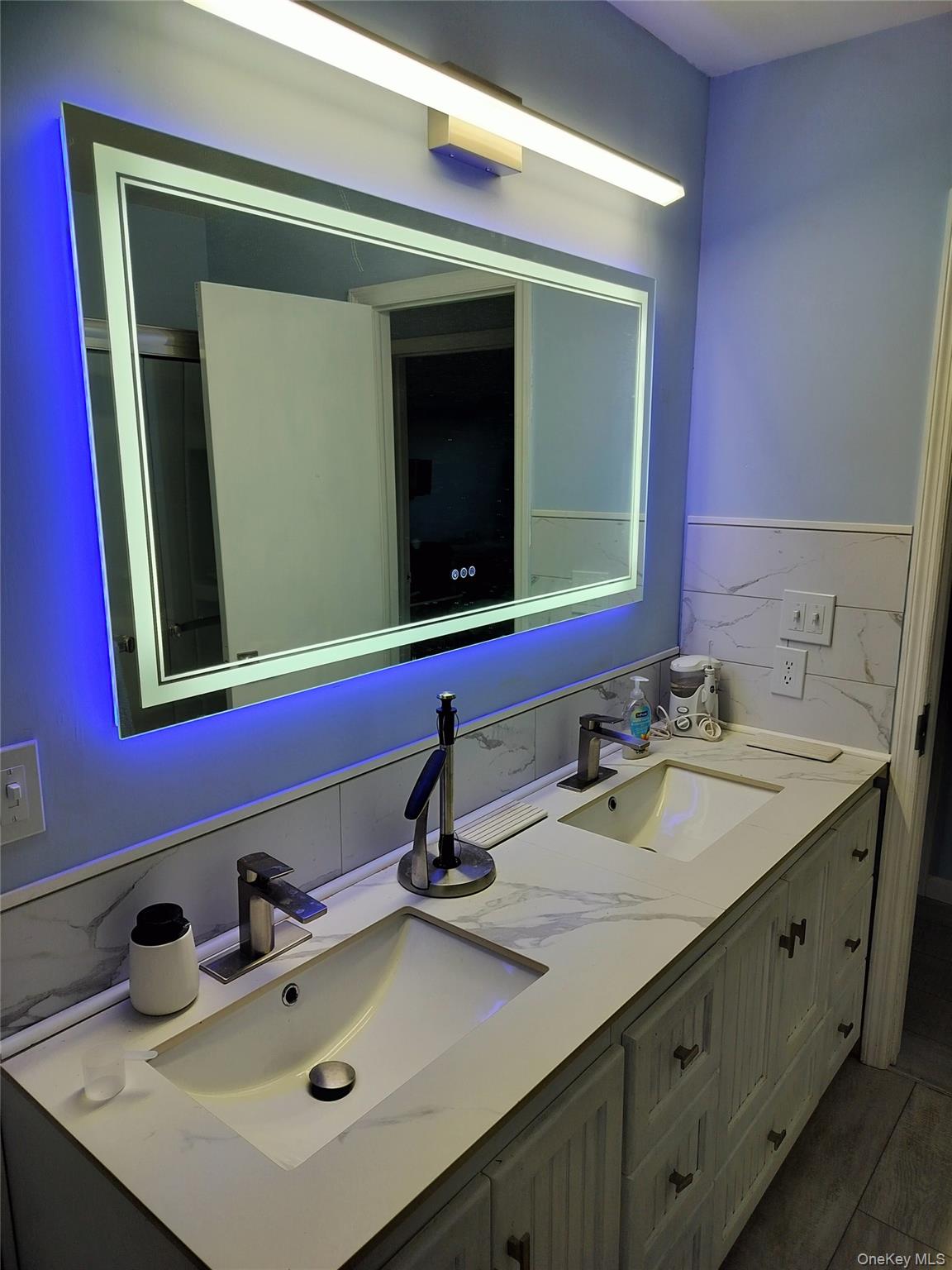 72 Martin Road Pleasant Valley, NY 12569 - Photo 5 of 5 a bathroom with a sink and a mirror