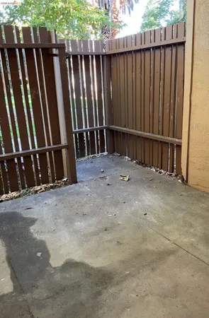 a view of a backyard of the house