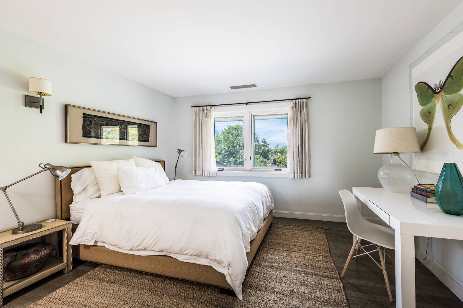 34 La Forest Lane East Hampton, NY 11937 - Photo 15 of 19 a bedroom with a bed a mirror and a window