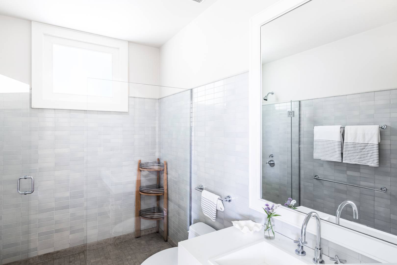 34 La Forest Lane East Hampton, NY 11937 - Photo 17 of 19 a bathroom with a sink and a mirror