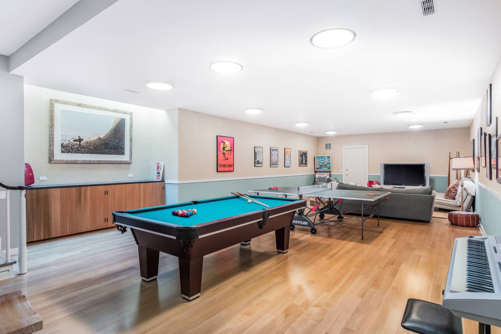 34 La Forest Lane East Hampton, NY 11937 - Photo 18 of 19 a living room with furniture pool table and a wooden floor