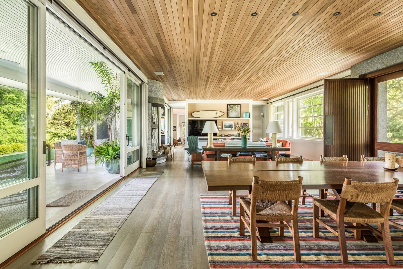 34 La Forest Lane East Hampton, NY 11937 - Photo 2 of 19 a view of a dining room with furniture wooden floor and a chandelier