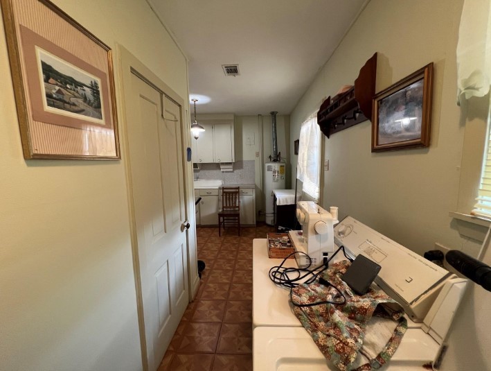 566 Schmidt Road Sealy, TX 77474 - Photo 17 of 20 a living room with furniture and a table