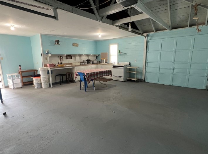 566 Schmidt Road Sealy, TX 77474 - Photo 5 of 20 a view of a livingroom with furniture and a ceiling fan