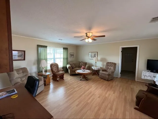 a kitchen with a table and chairs in it
