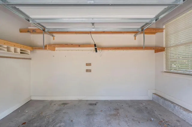 a view of a room with racks on the wall