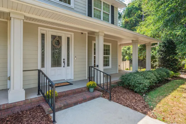 a front view of a house with porch
