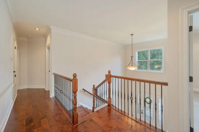 a view of a hallway with windows