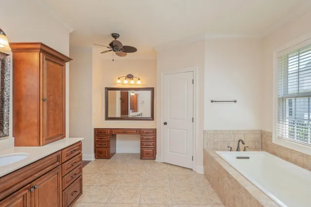a view of livingroom with hardwood floor and a ceiling fan