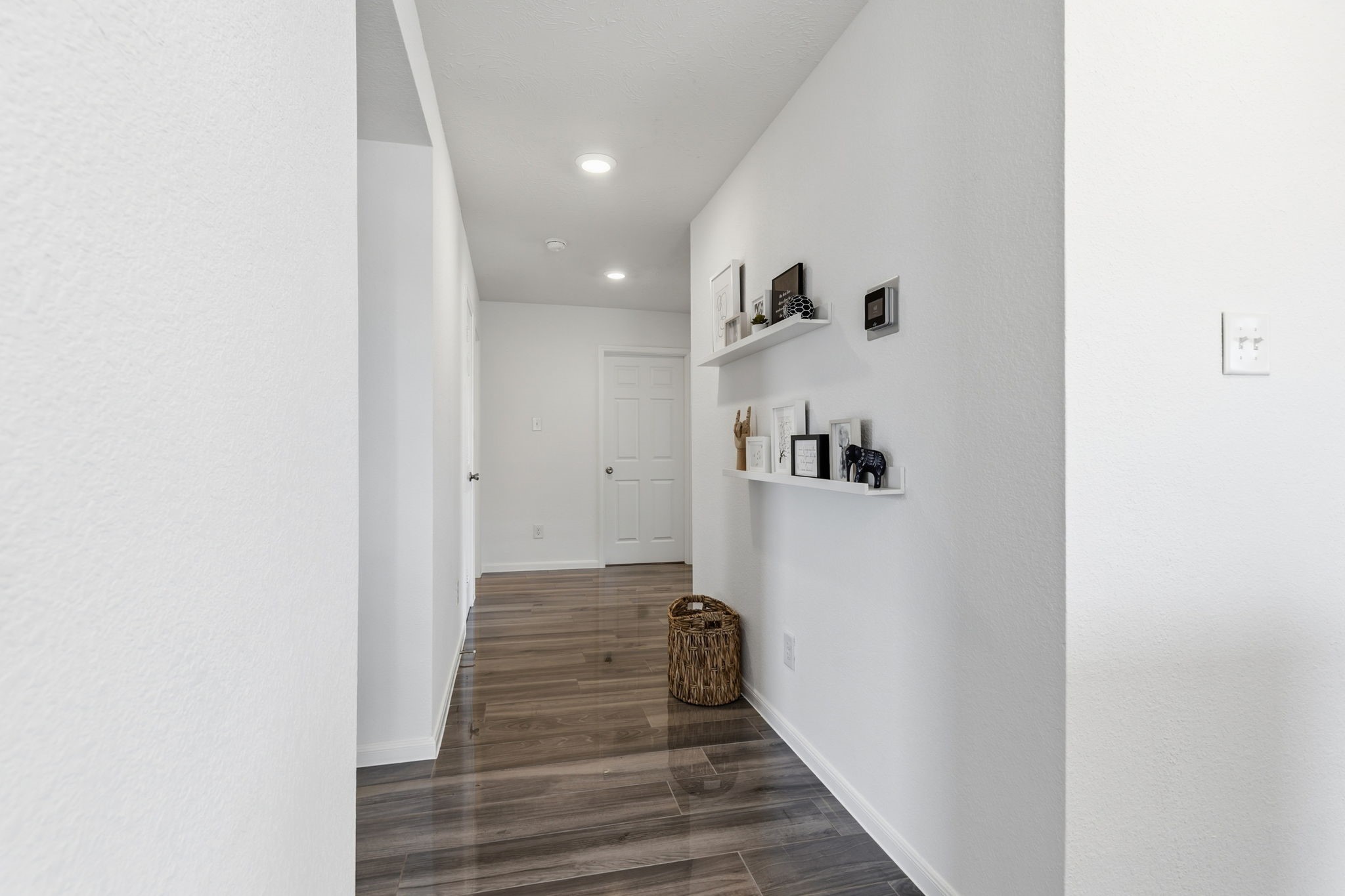 5127 Avondale Rise Street Katy, TX 77493 - Photo 39 of 47 a view of a hallway with wooden floor and entryway