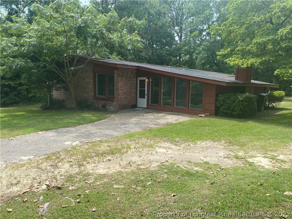 7608 Decatur Drive Fayetteville, NC 28303 - Photo 2 of 36 a front view of house with yard and green space