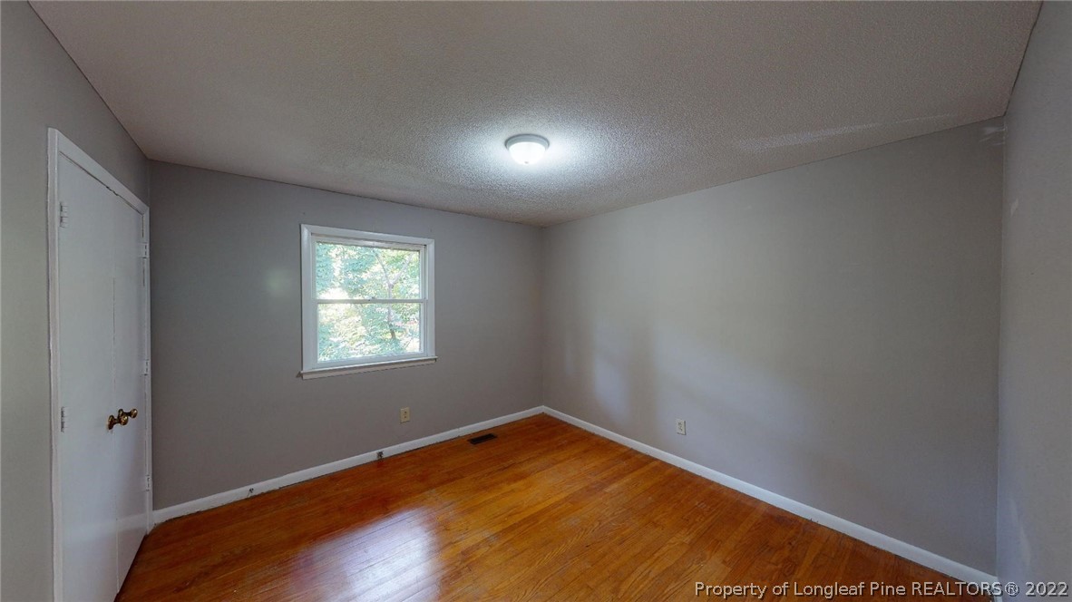 7608 Decatur Drive Fayetteville, NC 28303 - Photo 24 of 36 an empty room with a window