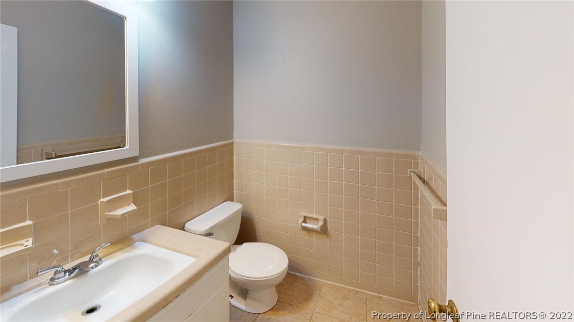 7608 Decatur Drive Fayetteville, NC 28303 - Photo 29 of 36 a bathroom with a sink and a toilet