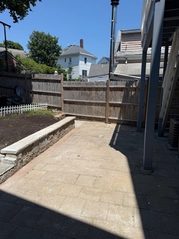 9 Foster Street, Unit 1 Gloucester, MA 01930 - Photo 13 of 13 a view of outdoor space and deck