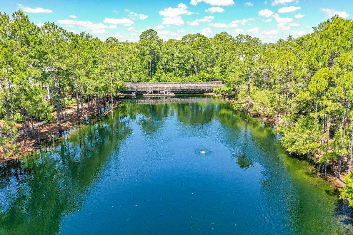 Lot 62 Pontchartrain S Santa Rosa Beach Santa Rosa Beach, FL 32459 - Photo 16 of 24 a view of a lake from a yard