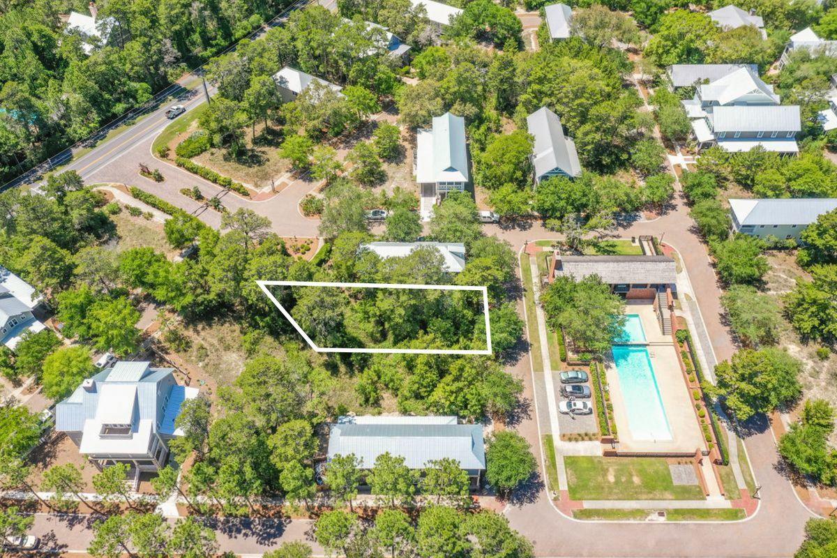 Lot 62 Pontchartrain S Santa Rosa Beach Santa Rosa Beach, FL 32459 - Photo 5 of 24 an aerial view of a house with a yard and plants