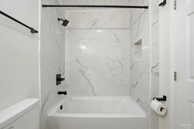 a bathroom with a bathtub