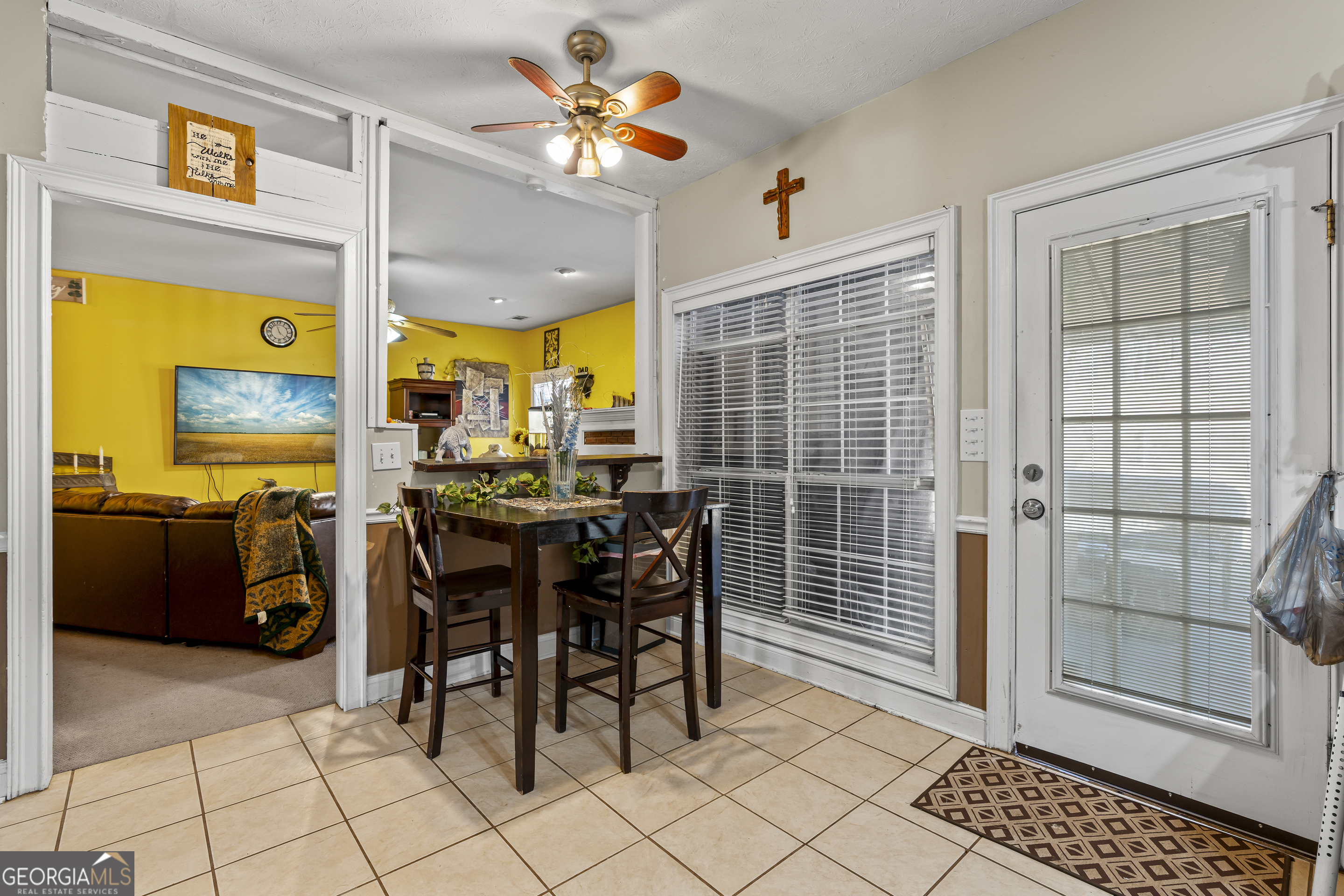 2498 Highway 212 Covington, GA 30016 - Photo 11 of 74 a view of a dining room with furniture window and outside view