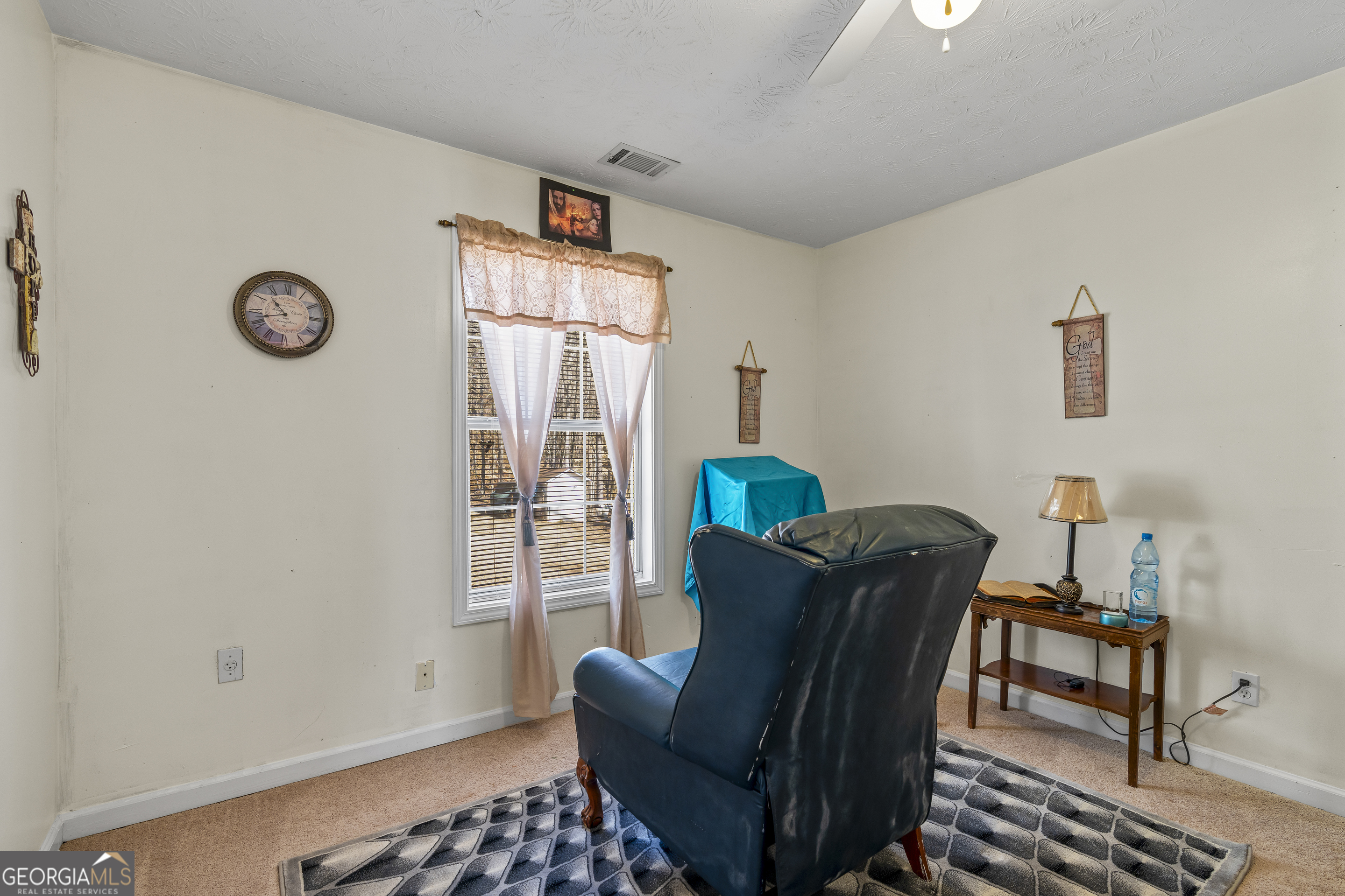 2498 Highway 212 Covington, GA 30016 - Photo 45 of 74 a view of a dining room with furniture and a window