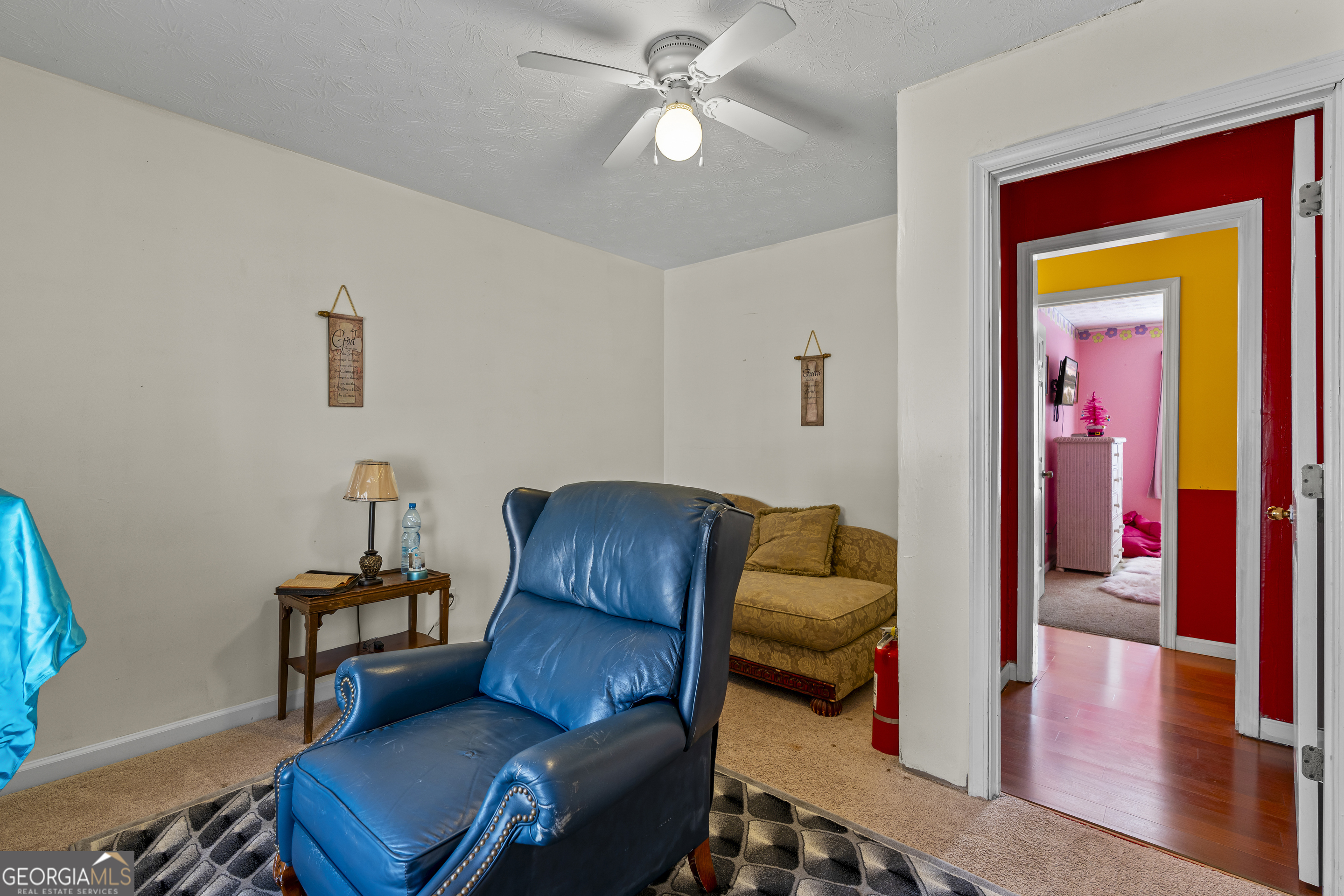 2498 Highway 212 Covington, GA 30016 - Photo 47 of 74 a living room with furniture and a lamp