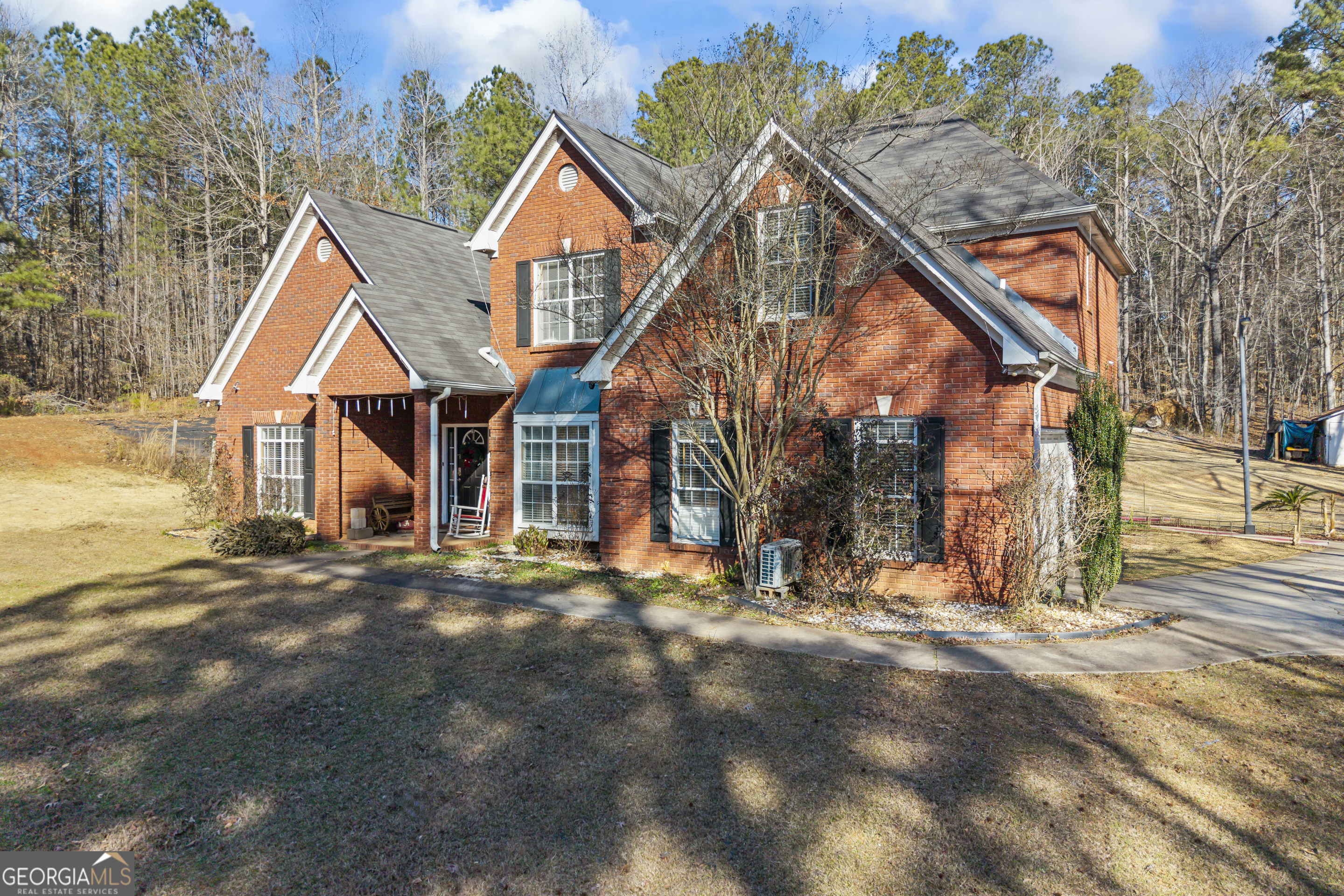 2498 Highway 212 Covington, GA 30016 - Photo 53 of 74 a view of a house with a yard