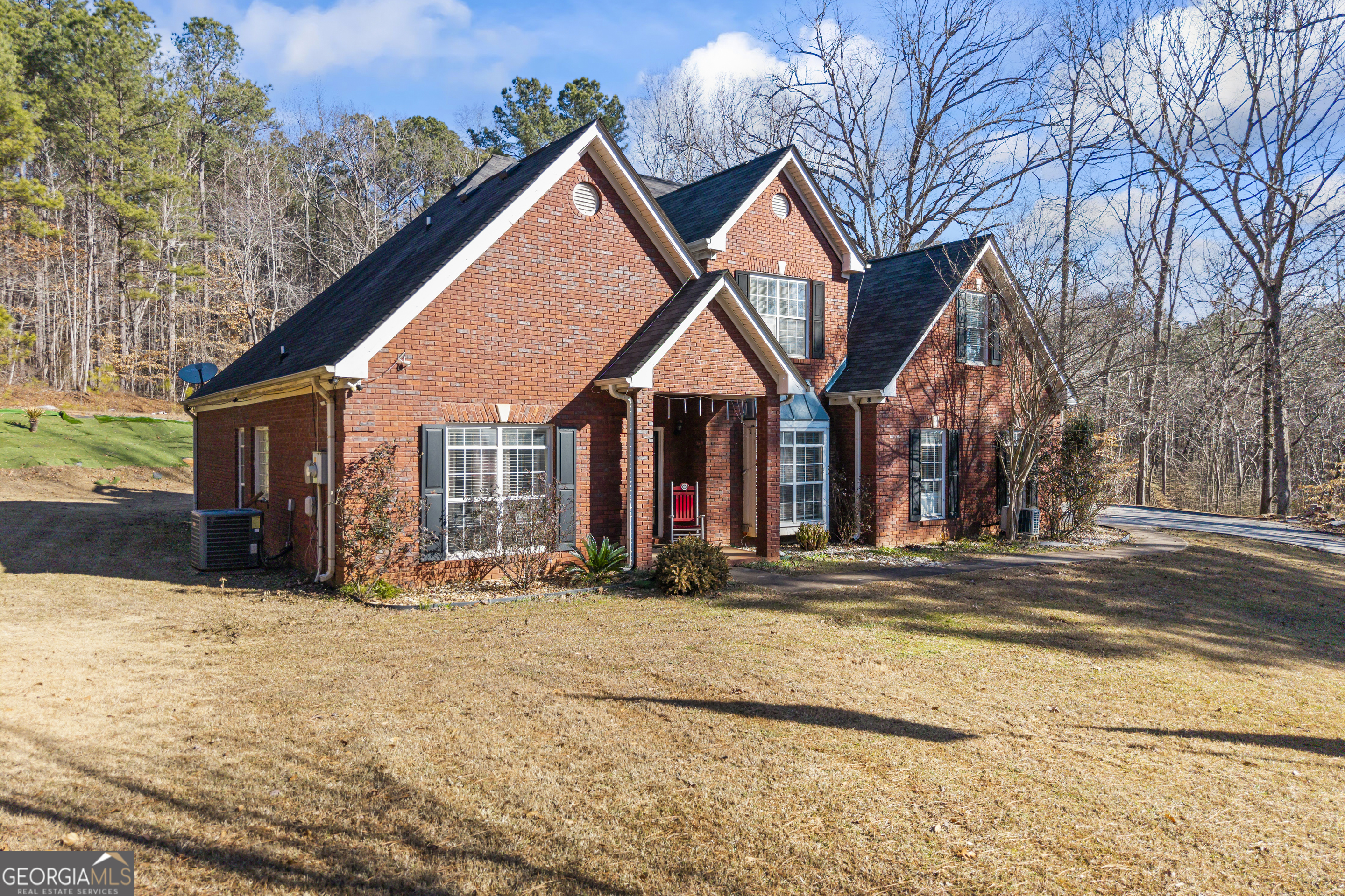 2498 Highway 212 Covington, GA 30016 - Photo 54 of 74 a view of a house with snow on the road