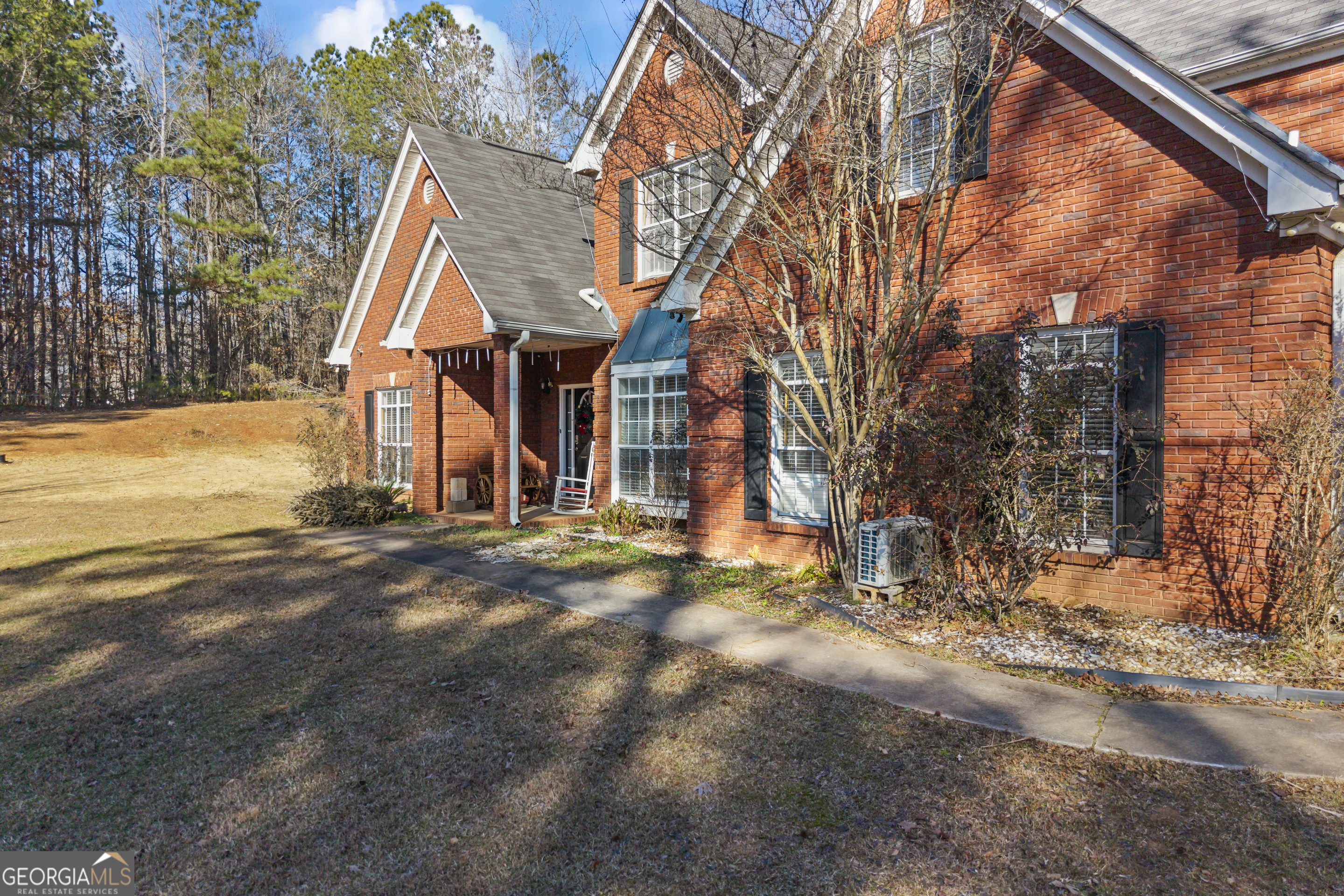 2498 Highway 212 Covington, GA 30016 - Photo 55 of 74 a view of a house with snow on the road