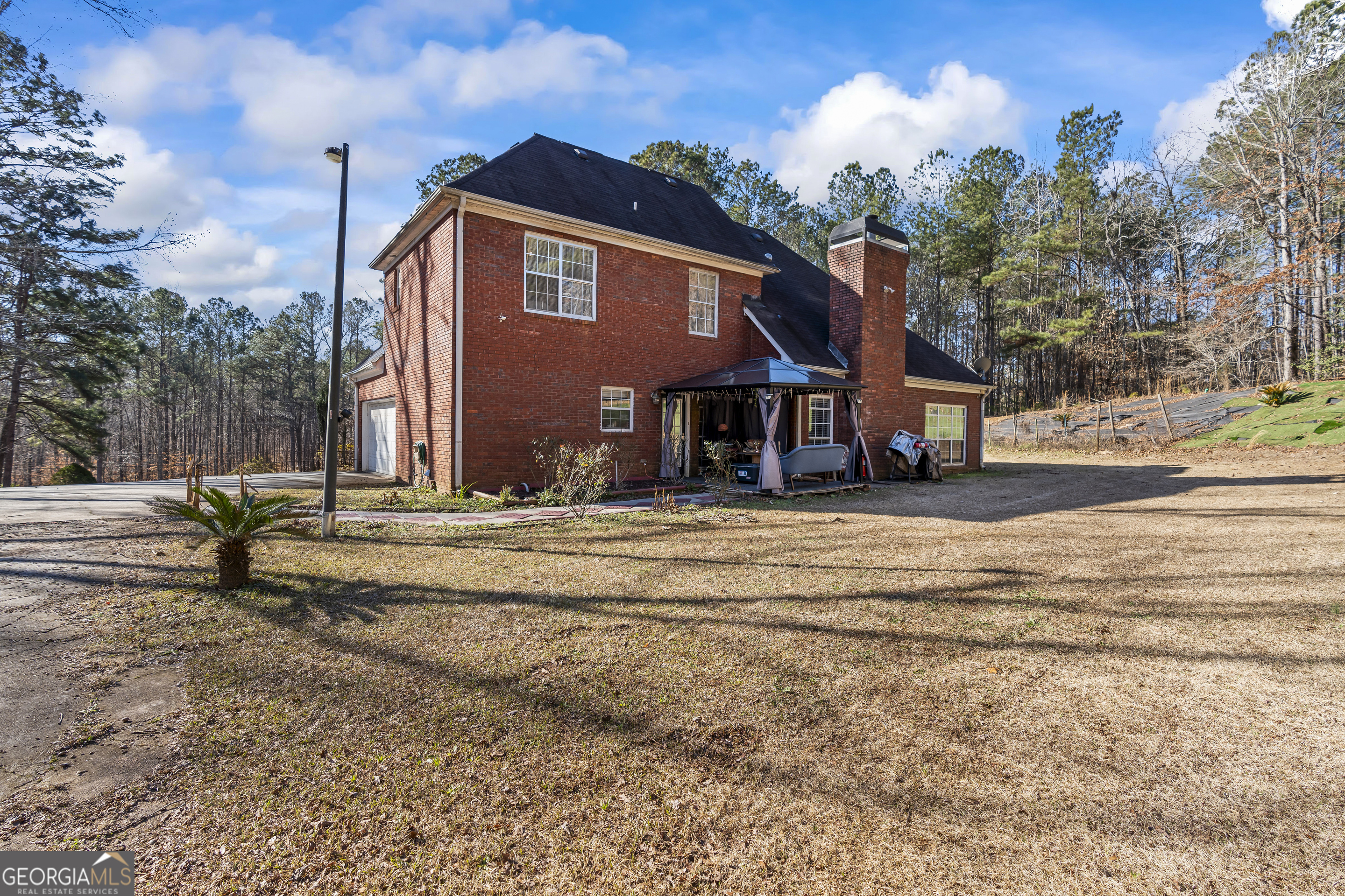 2498 Highway 212 Covington, GA 30016 - Photo 59 of 74 a front view of a house with a yard