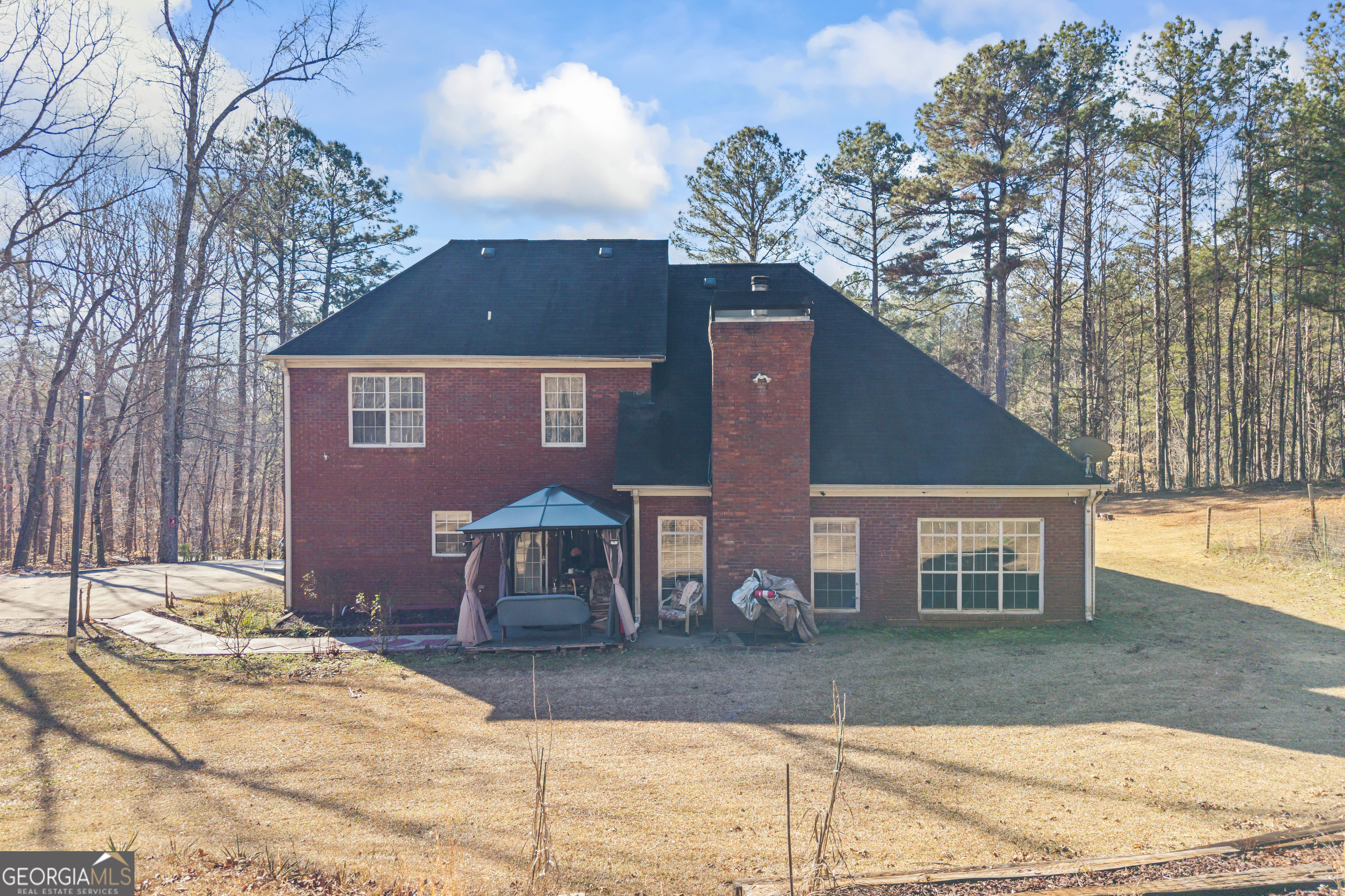 2498 Highway 212 Covington, GA 30016 - Photo 60 of 74 a view of a house with a yard