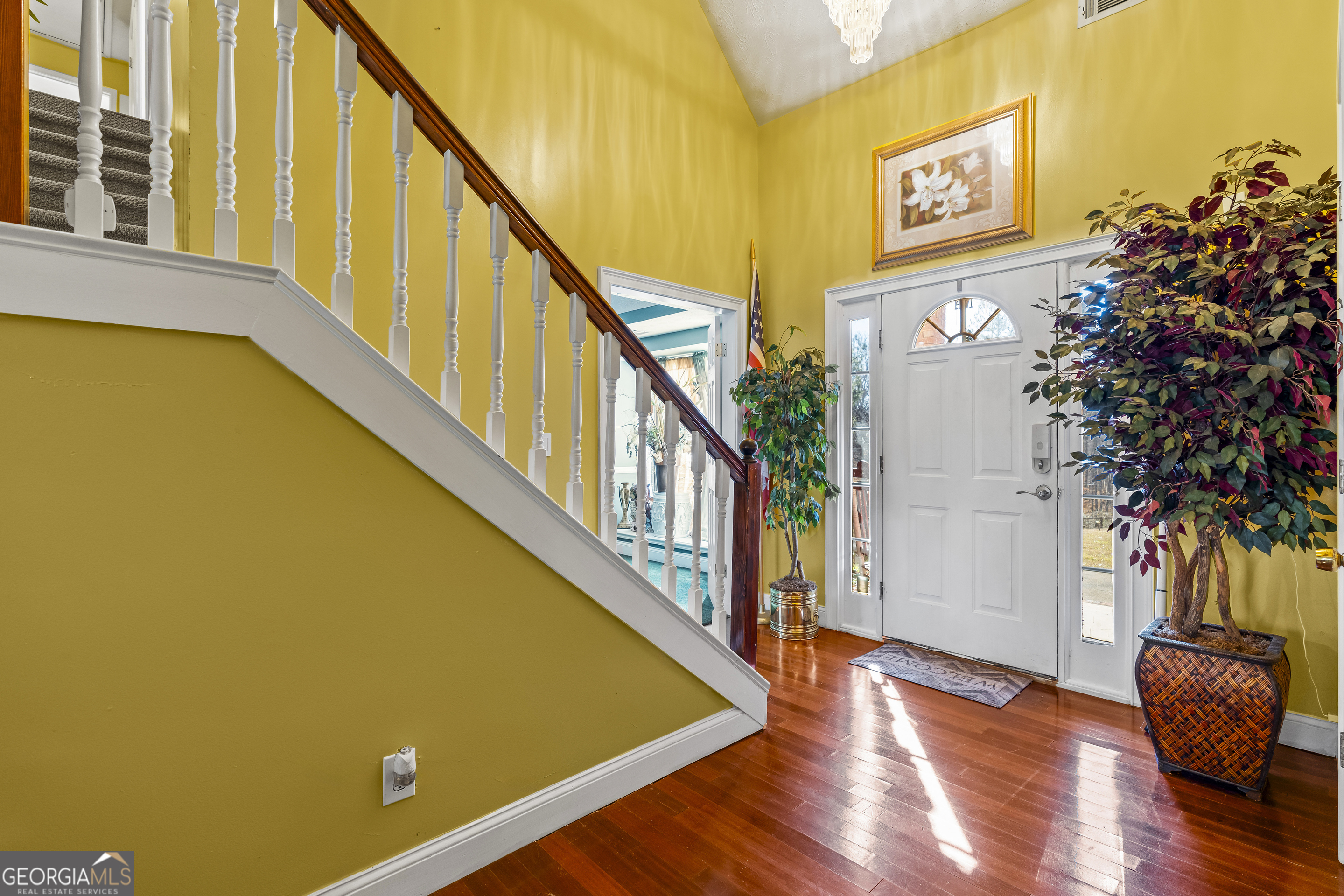 2498 Highway 212 Covington, GA 30016 - Photo 6 of 74 a view of an entryway with wooden floor and fence