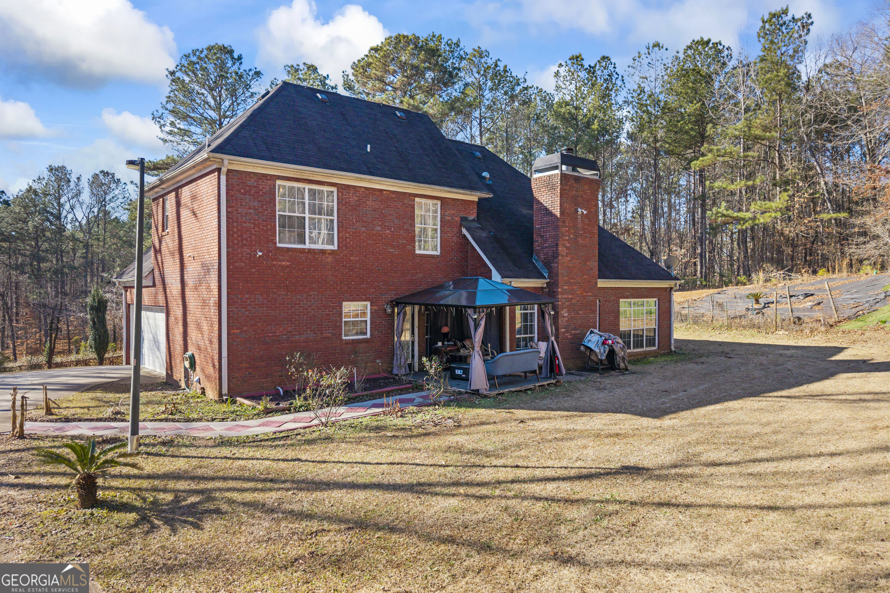 2498 Highway 212 Covington, GA 30016 - Photo 61 of 74 a view of a house with a yard