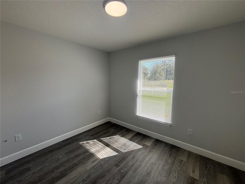 13187 Southwest 103rd Place Dunnellon, FL 34432 - Photo 14 of 24 an empty room with a window