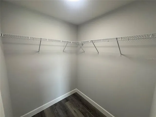 a view of a room with racks on the wall