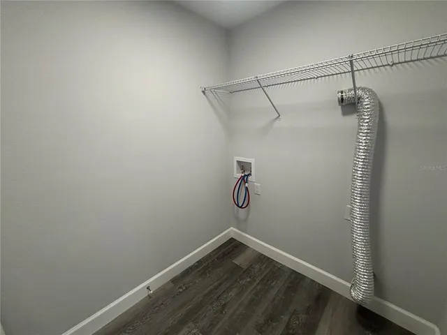 a view of a room with racks on the wall