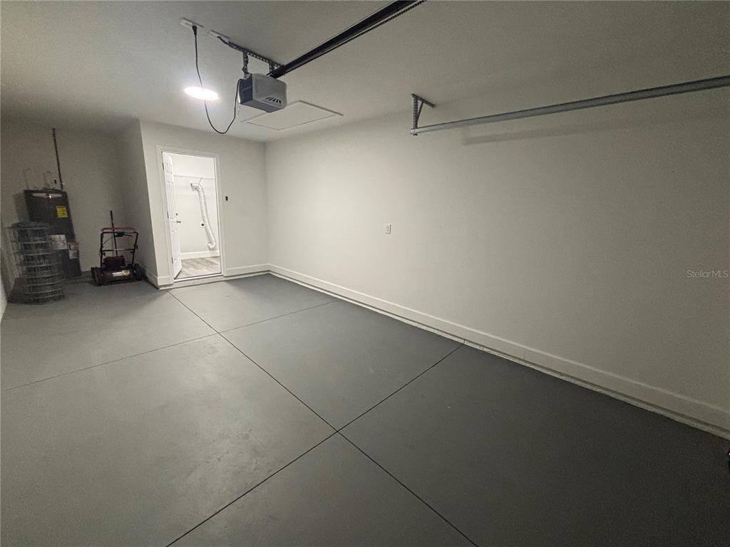 13187 Southwest 103rd Place Dunnellon, FL 34432 - Photo 20 of 24 a view of a room with a utility room