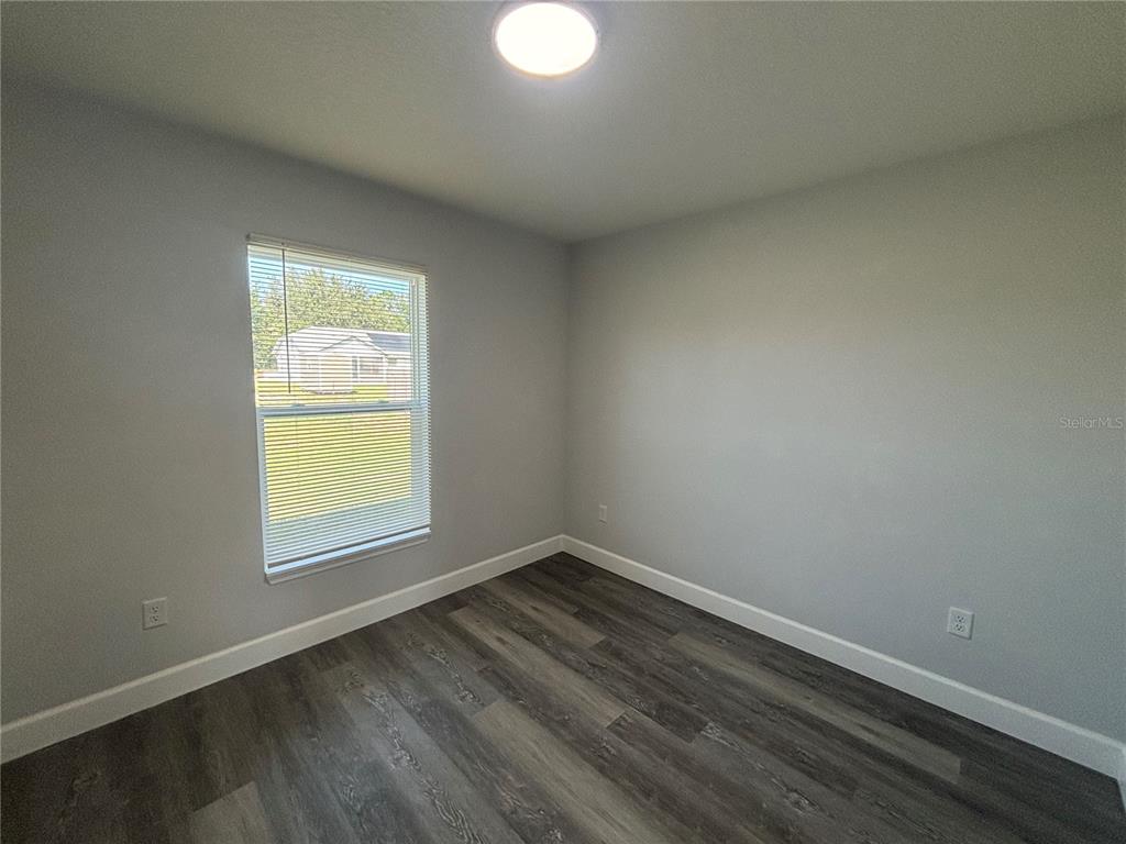 13187 Southwest 103rd Place Dunnellon, FL 34432 - Photo 10 of 24 an empty room with a window