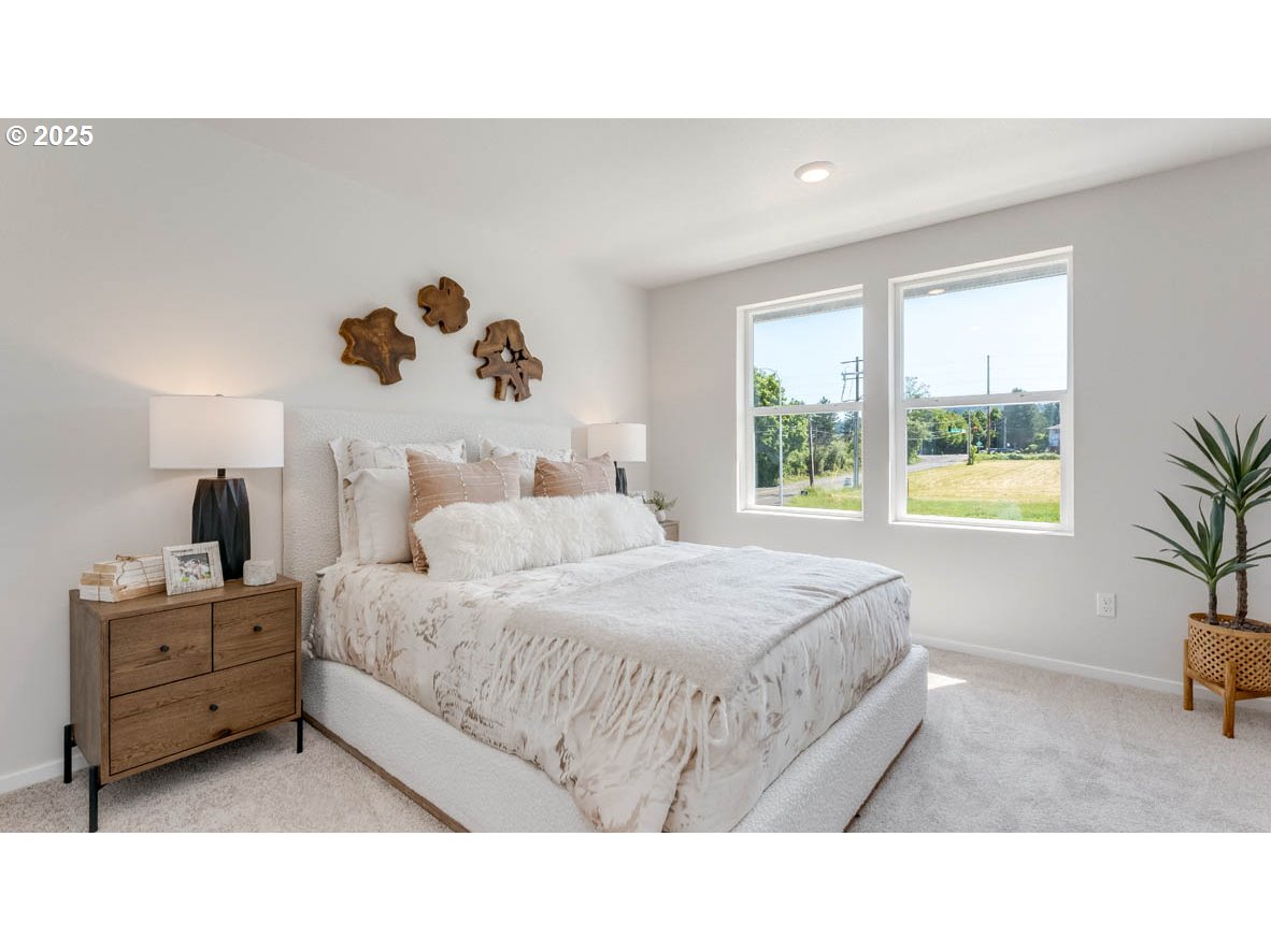 3505 Southwest Thomas Avenue Gresham, OR 97080 - Photo 22 of 26 a bedroom with a bed and window