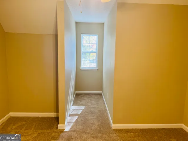 an empty room with window