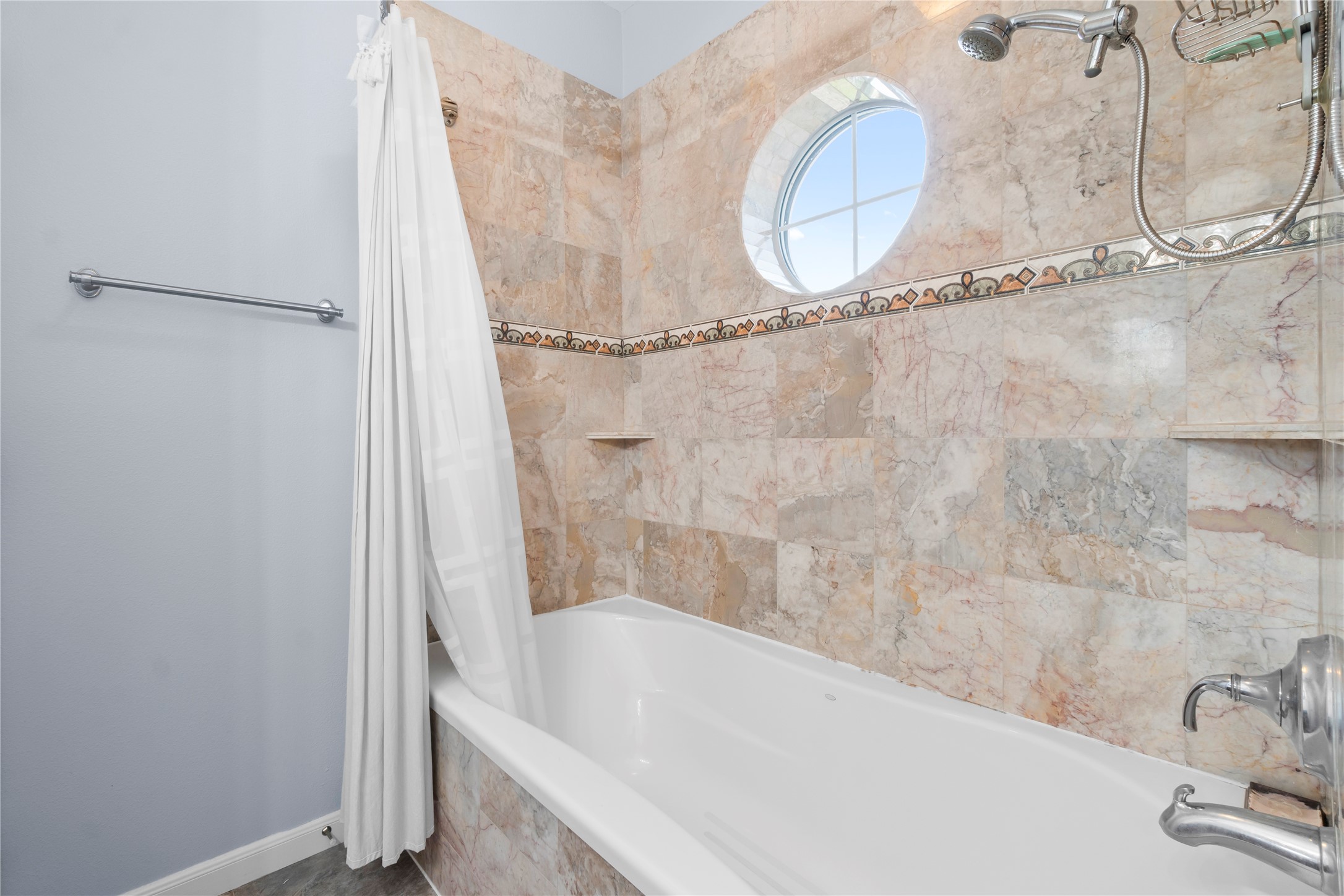 427 2nd Street San Leon, TX 77539 - Photo 22 of 30 a bathroom with a bath tub and a shower