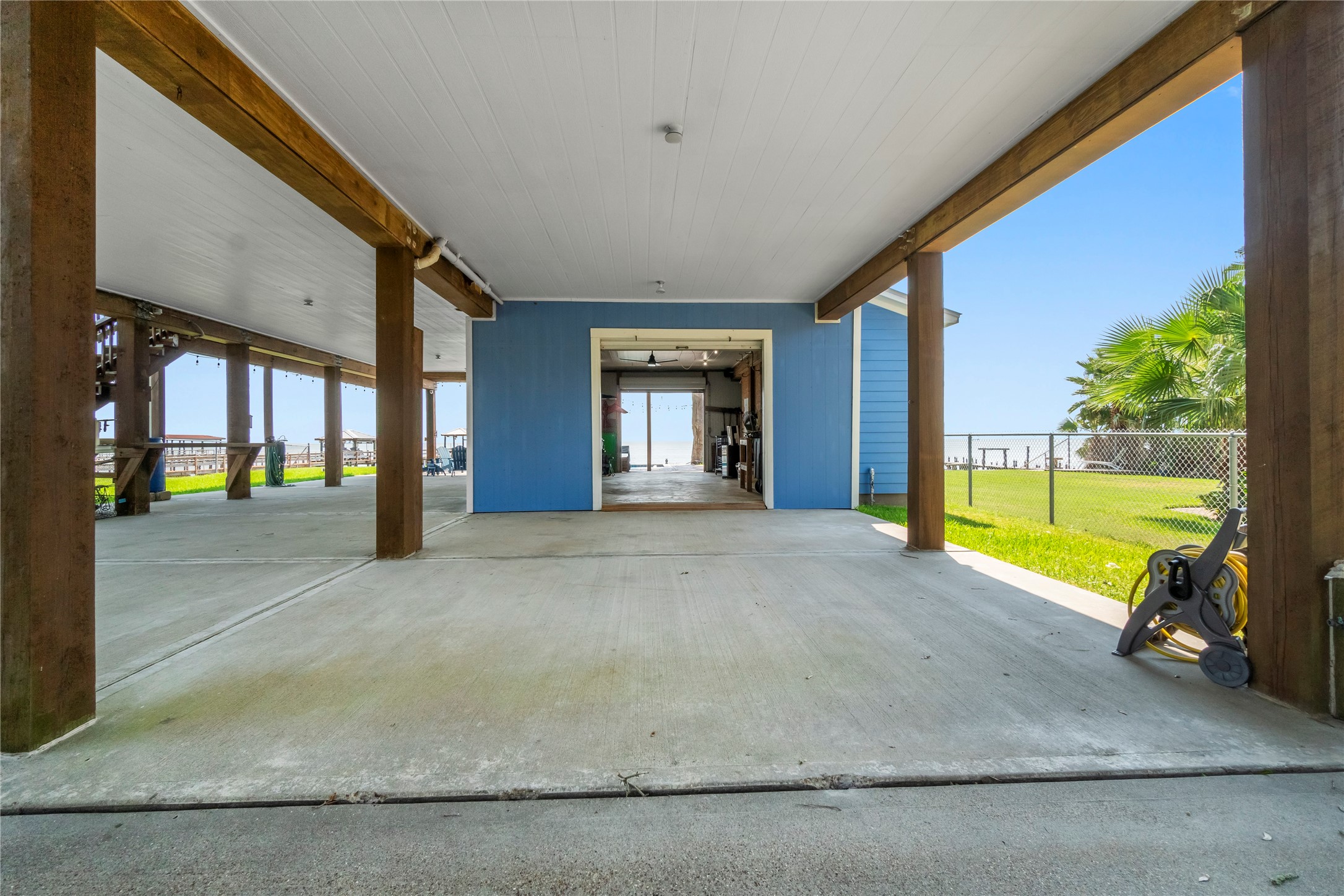 427 2nd Street San Leon, TX 77539 - Photo 10 of 30 a view of an empty room with a fireplace and windows