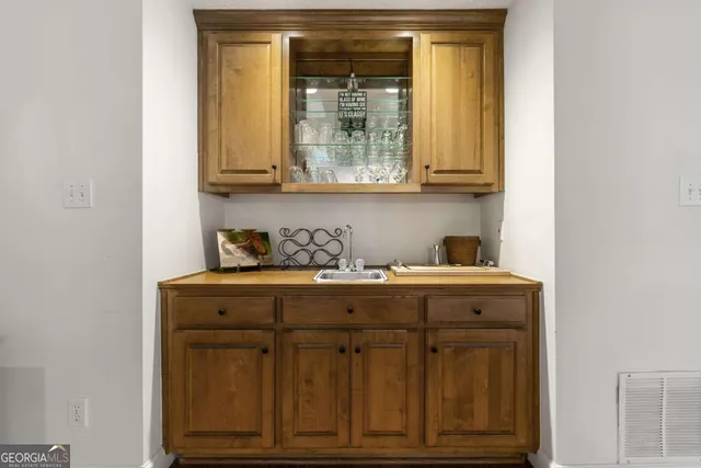 a living room with furniture fireplace and flat screen tv