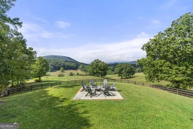 a view of a lake with a big yard