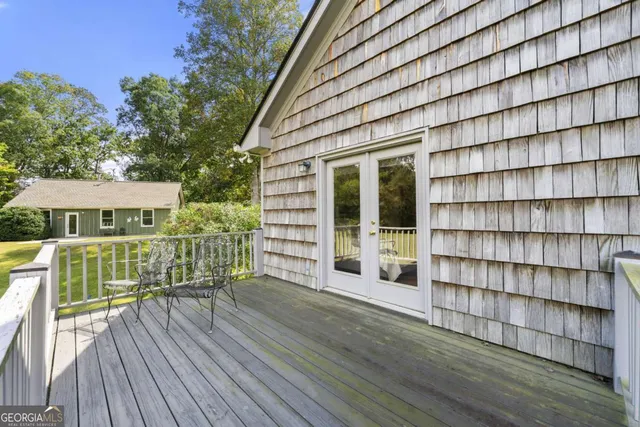 a view of a room with porch and furniture