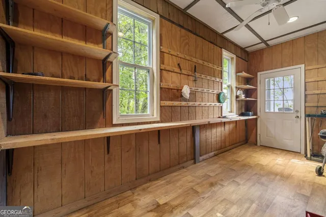 a view of a yard with a large trees